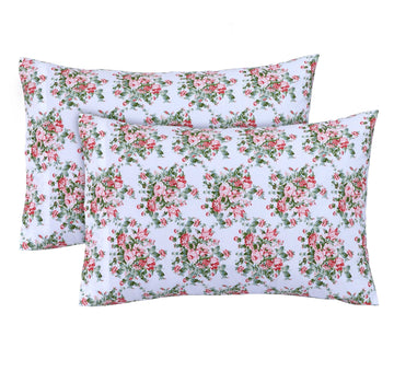 Feather Stitch New York floral design 300 thread count pillowcases with pink and green flowers on white background