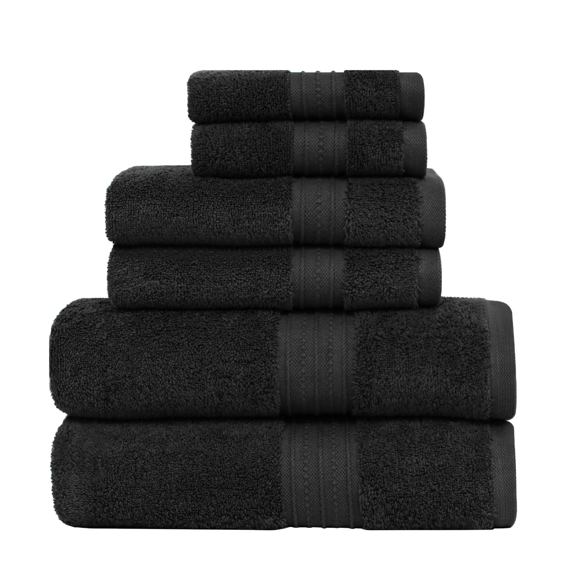 Stack of black towels on a white background