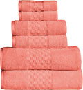 Stack of pink towels on a white background