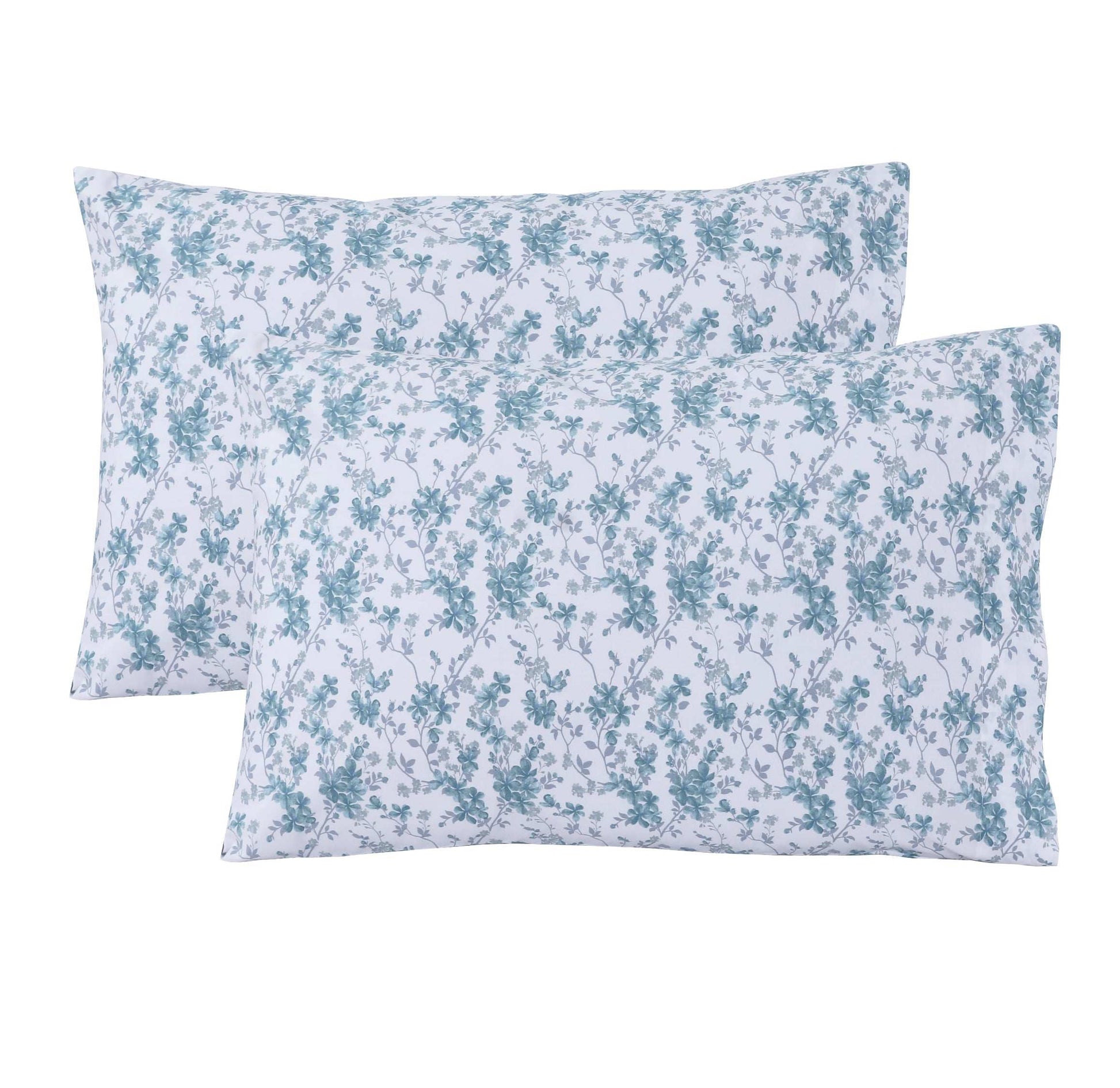 Feather Stitch New York 300 thread count pillowcases with blue floral design on white background
