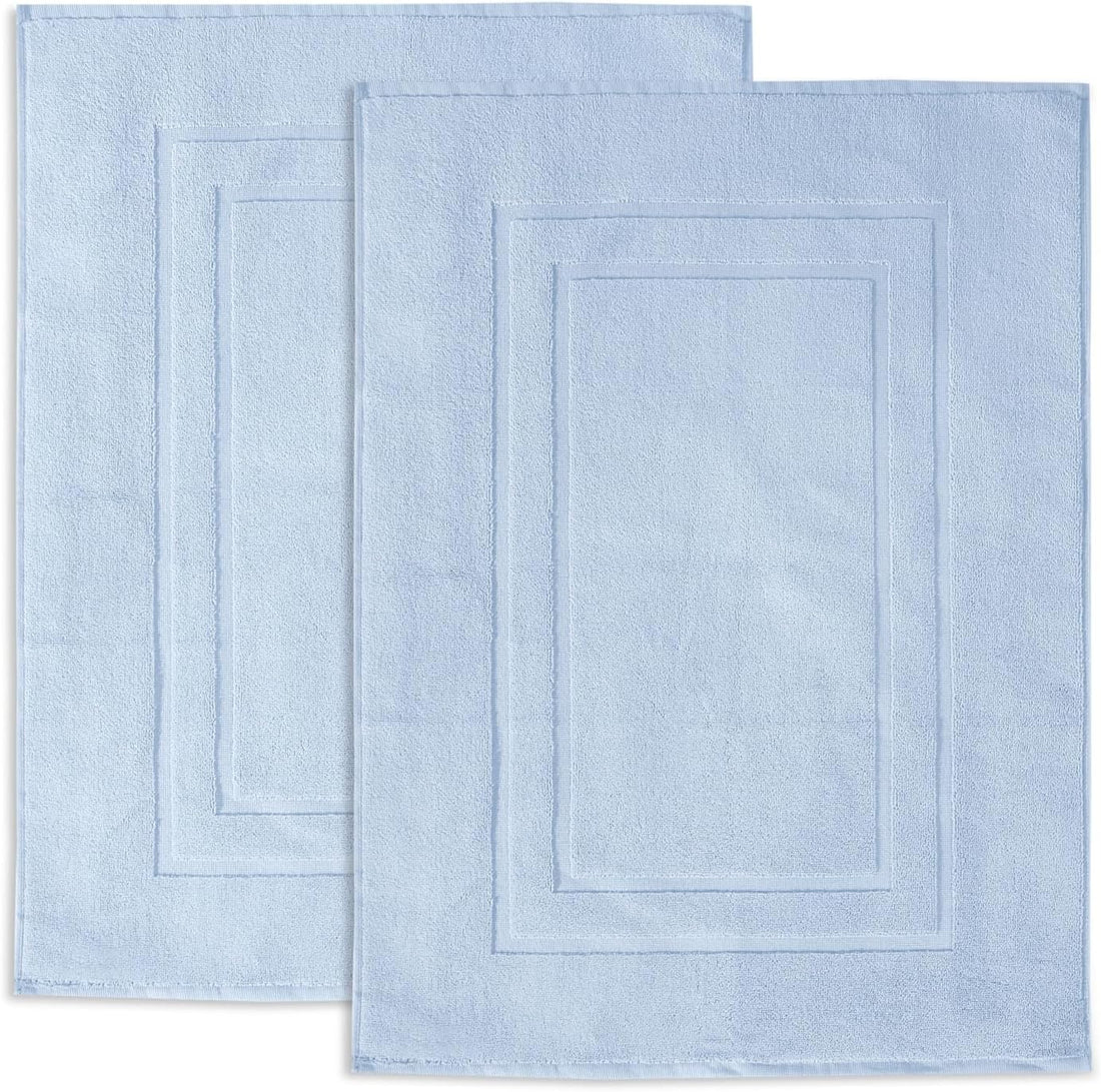 Feather Stitch New York luxury bath mat set in soft sea foam with a textured border design